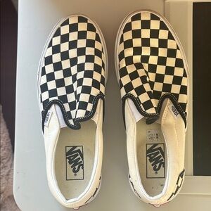 VansBlack and White Checkered Slip-On Sneakers